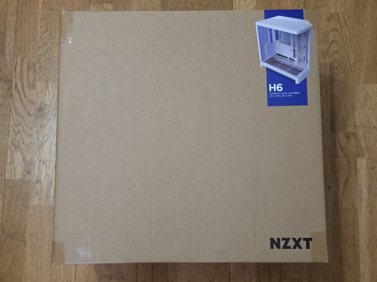 Análisis NZXT H6 (2026): Cristal panorámico curvo y flujo de aire de doble cámara